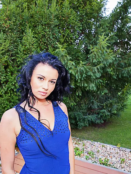 Filthy brunette Grace Joy is on the green grass showing off big