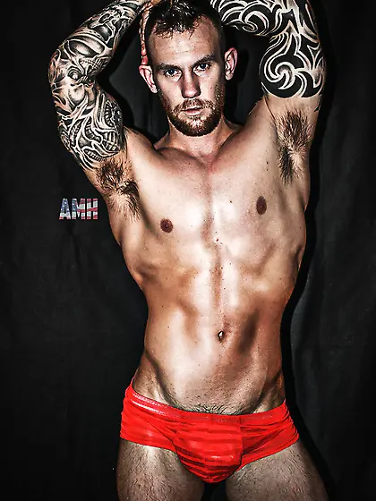 Bad tattoed guy strips