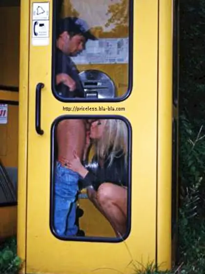 Public Phone Booth Blowjob Sex Caught on Camera