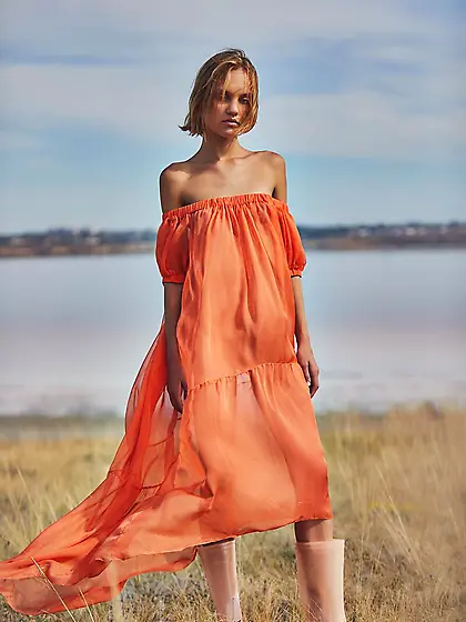 Lovely skinny teen poses undressed outdoors