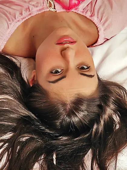 Long haired brunette Sasha Grey shows her small nipples ad stret