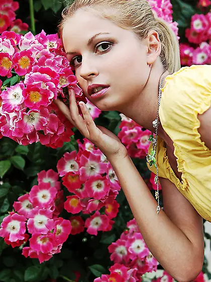 Julia Al takes all of her clothes outdoors on the rocks and show