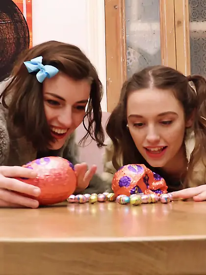 Amateur lesbians Willow A and Luci Q licking on the couch