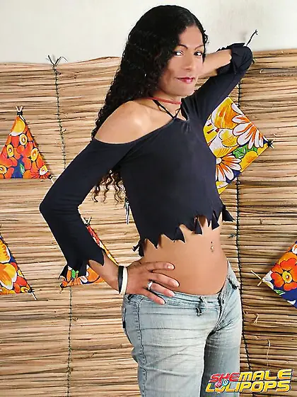 Curly haired brunette TS Randia stripping