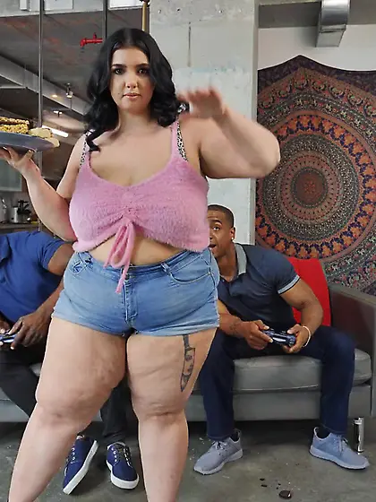 Fat brunette with pierced nipples serves two BBCs