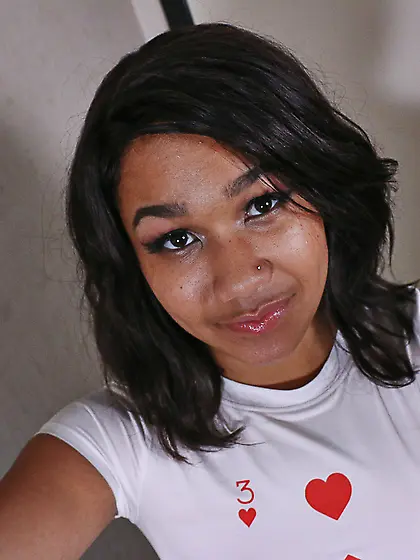 Black beauty Loni Legend takes off her red panties to masturbate