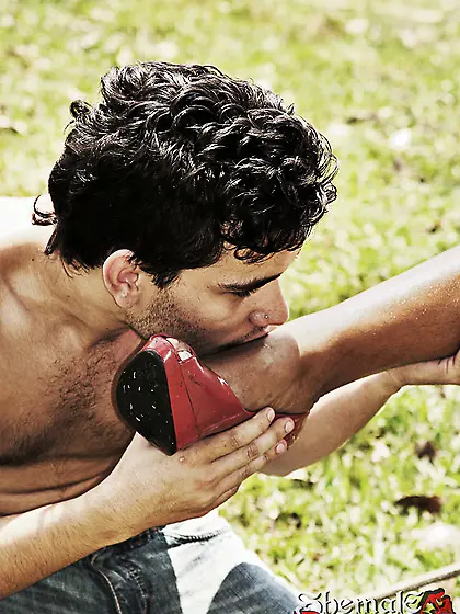 Tgirl in latex dominates a man