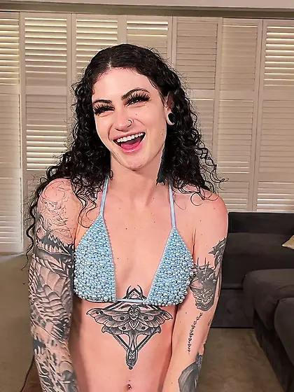 Lavishly tattooed brunette in bikini gets boned in the living ro