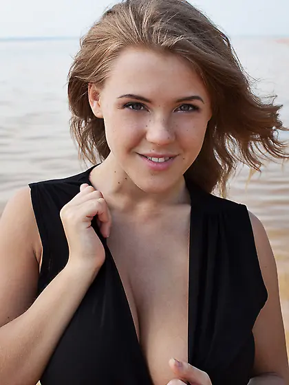 Blond-haired beauty takes off her one-piece to show these huge k