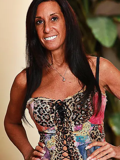 Slim big titted brunette milf in tight jeans Cheryl Conner strip