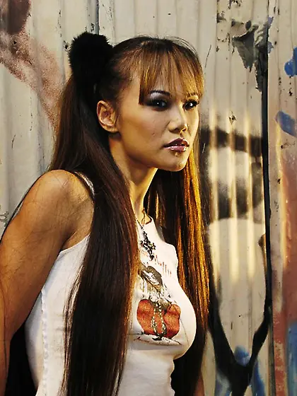 Cute Asian teen Mia Smiles strips her mini skirt and teases in b