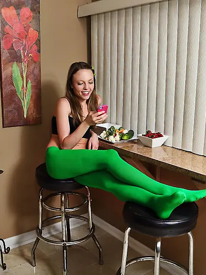 Aubrey Star is a teen honey posing in sexy pantyhose and showing