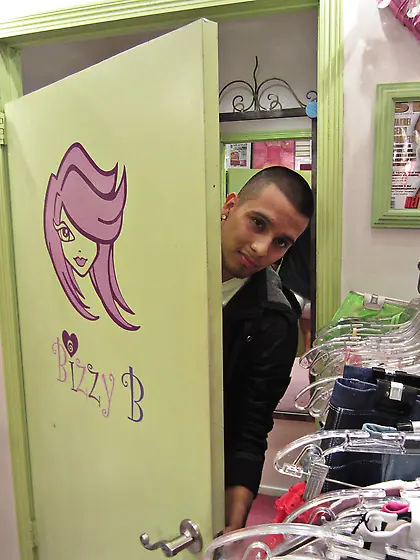 Young gay hunk undressing