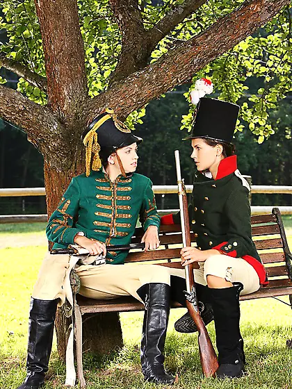 Lesbian in boots Deny and Olivia Alize take off their medieval c