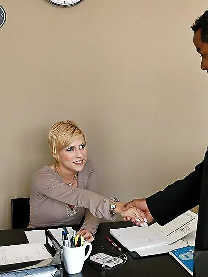 Sluty secretary Amber Wild loves taking a big black cock up her