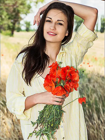 Delicious brunette Lilian A is getting nude at the field and dem