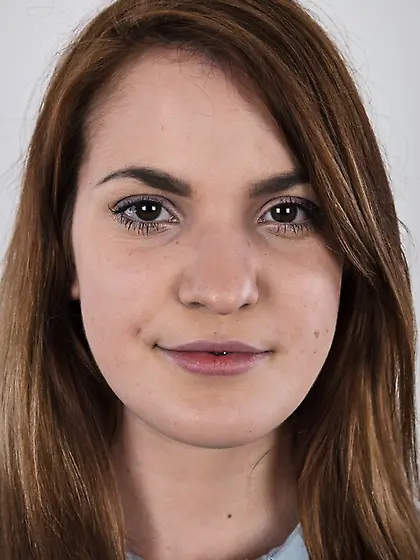 She has a signature boring office style that makes her sexy