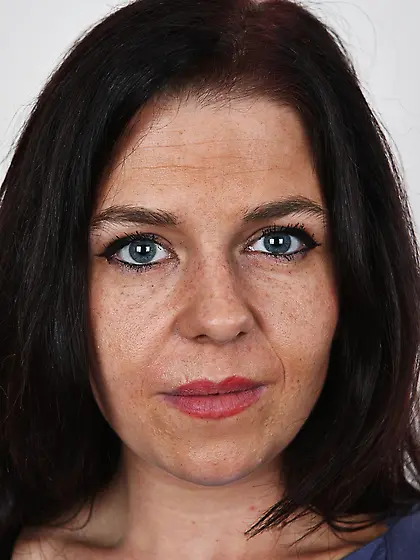 Black-haired woman takes clothes off to show saggy tits and smal