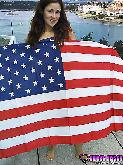 Hot American babhe Sweet Krissy poses outdoors wearing on just a