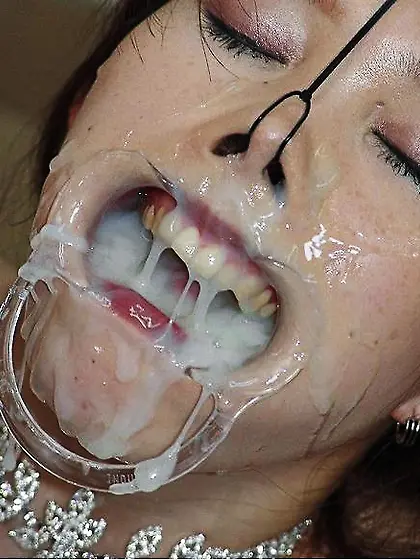 Brunette with mouth full of cum