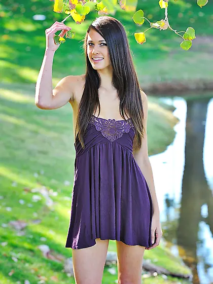 Beautiful brunette model Tiffany Thompson strips her purple dres