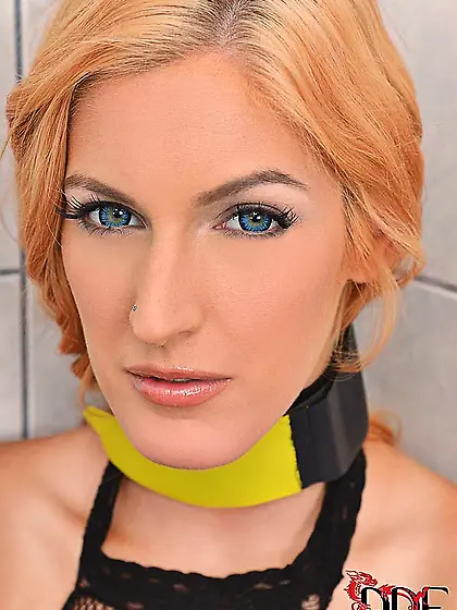 Tied up blond lassie in fishnets is caught in the bathroom peein