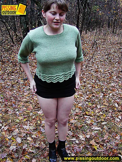 Pissing outdoor on dried leaves on a ground