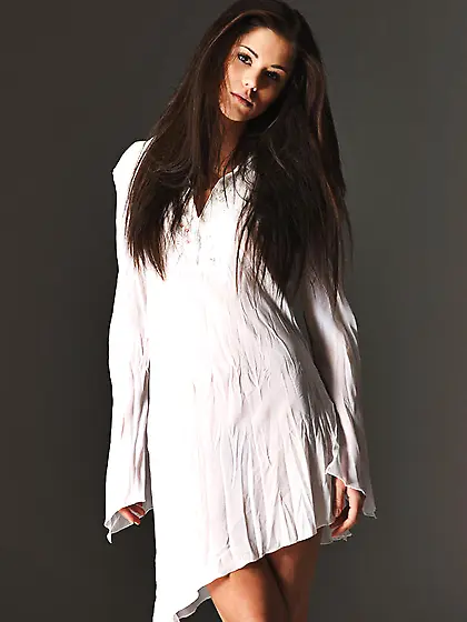 Saucy doe-eyed brunette shows