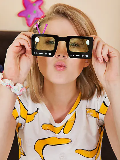 Playful blonde in sexy stripped socks loves to walk naked in the