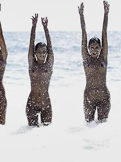 5 bare women at the beach