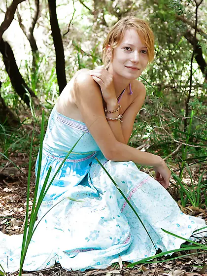 Redheaded adventurer showing her firm ass in the woods too