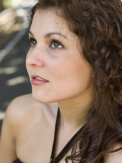 Babe is not ashamed to show off her big tits and booty in the mi