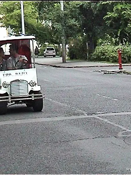 Lora Craft kneels before her horny boyfriend and sucks his big,