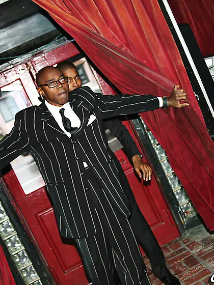 Sultry short-haired brunette in stockings enjoys two black dicks