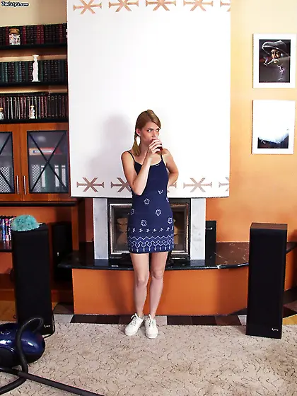 Cute teen maid Katalin Kiraly strips in the living room and toys