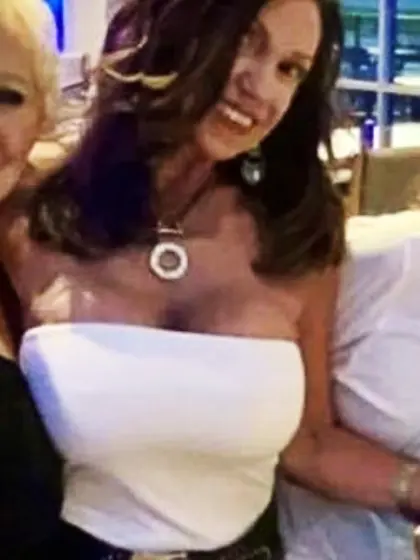 Rhonda roots for her team with her tits out