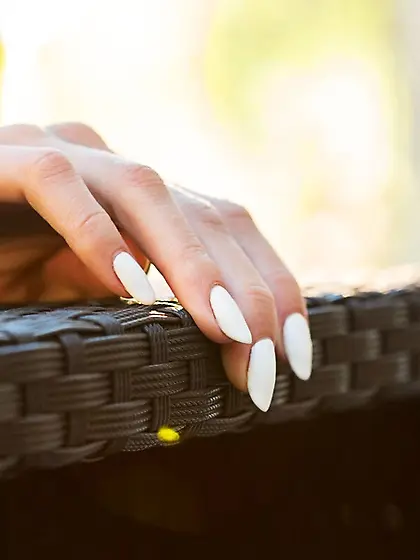 Gorgeous brunette pulls pants