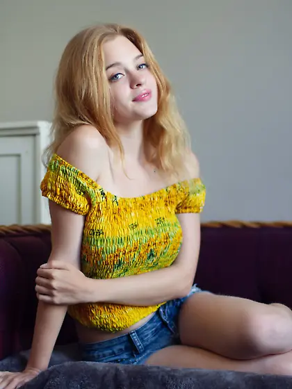 Adorable blonde in denim shorts seeks hot ways to seduce