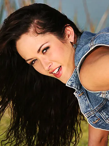 Brunette Carmella Bing with long hair and big tits dildos her sh