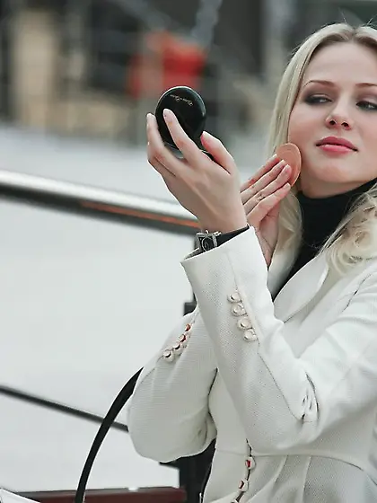 Lovely blonde showing off her body on a yellow couch and being k