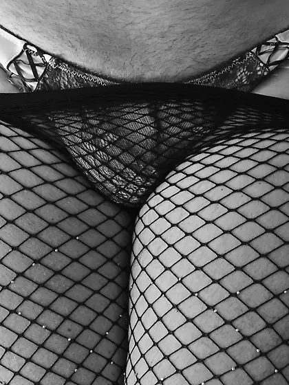 Fishnet tights and cock in panties