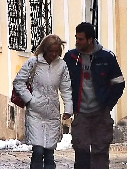 Sheila Grant takes her sexy orange lingerie off and then fingers