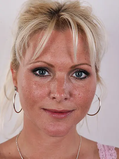 Innocent blonde MILF not shy to show curious photographer her na