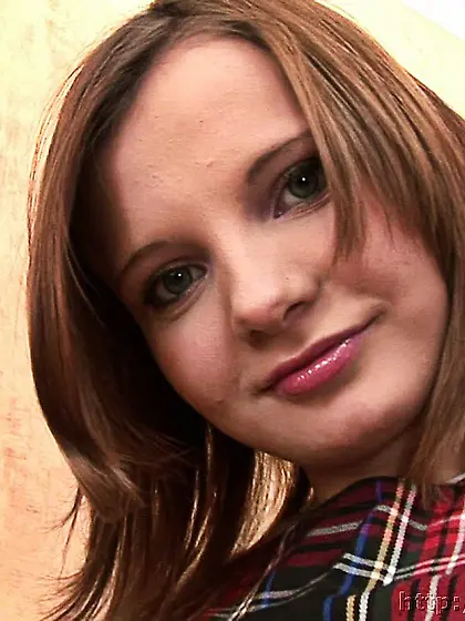 Russian teen brunette masturbates on the armchair