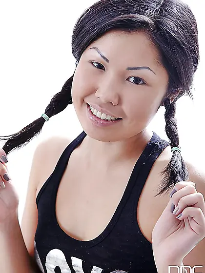 Sexy Asian hussy undresses slowly and flaunts her body on the ma