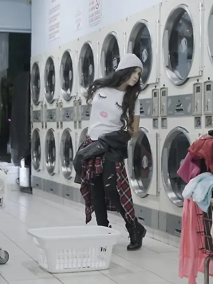 Hipster-looking brunette gets fucked while waiting on her washer