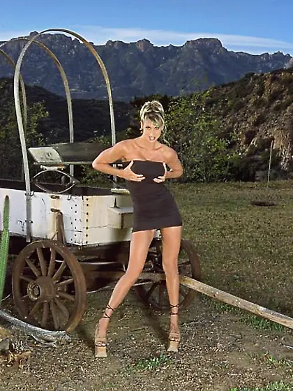 Good looking busty blonde Kara Styler strips outdoors and shows