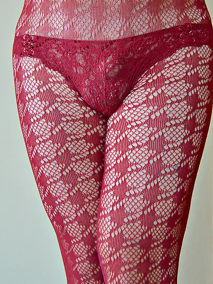 Fishnet tights and cock in panties