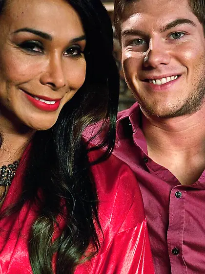 Brunette t-girls condom-covered cock