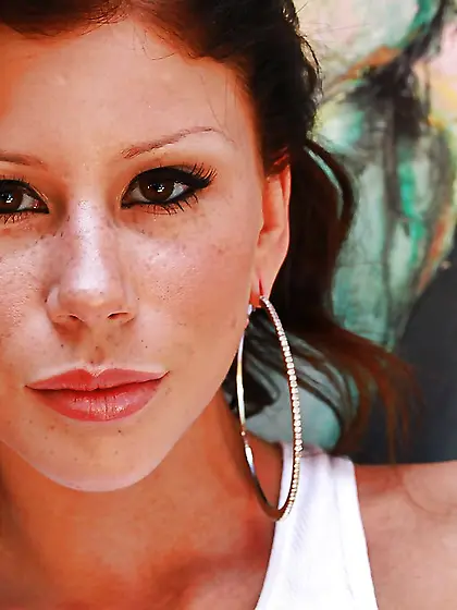 Director films little strip show performed by black-haired seduc